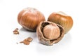 Freshly cracked hazelnuts showcasing the delicious interior on a clean surface Royalty Free Stock Photo