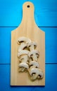 Freshly cut champignons mushrooms Royalty Free Stock Photo