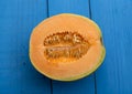 Half portion of freshly cut muskmelon Royalty Free Stock Photo