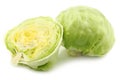 Freshly cut halves of iceberg lettuce