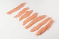 Freshly cut raw chicken strips on white background Royalty Free Stock Photo