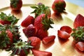 Freshly Cut Strawberries on Gold Plate