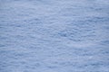 Freshly Fallen Snow on the Ground with Ice Crystals in Winter