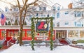 freshly fallen white snow on entrance to Red Lion Inn decorated for Christmas