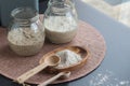 Freshly fermented rye and wheat starters in glass jars