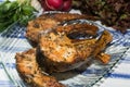 Freshly grilled fish on kitchen table. closeup, top view Royalty Free Stock Photo