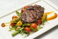 Freshly grilled steak middle raw with vegetables Royalty Free Stock Photo