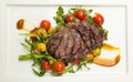 Freshly grilled steak middle raw with vegetables Royalty Free Stock Photo