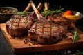Freshly grilled Tomahawk steaks on wooden cutting board