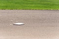 Freshly groomed baseball field with base plate, dirt and grass only Royalty Free Stock Photo