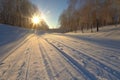 freshly groomed ski slope with sun flare Royalty Free Stock Photo