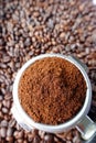 Freshly ground coffee beans in a metal filter Royalty Free Stock Photo