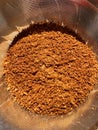 Freshly ground coffee in a metal brewing filter, close-up Royalty Free Stock Photo