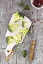 Freshly halved green broccoli served on the wooden Royalty Free Stock Photo