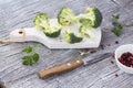 Freshly halved green broccoli served on the wooden Royalty Free Stock Photo