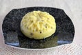 Artisan cheese with seeds in the shape of a flower