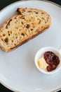 Freshly homemade baked sour dough rye bread sliced and served with jam and butter Royalty Free Stock Photo