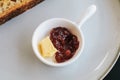 Freshly homemade baked sour dough rye bread sliced and served with jam and butter Royalty Free Stock Photo