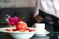 Freshly homemade Pancakes Strawberry Crumble on white dessert plate