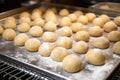 freshly kneaded dough balls ready to be shaped into pretzels