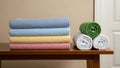 Freshly Laundered Striped Bedding and Rolled Bath Towels Royalty Free Stock Photo
