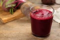 Freshly made beet juice in glass on table. Space for text Royalty Free Stock Photo