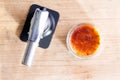 Freshly made creme brulee with a butane torch Royalty Free Stock Photo