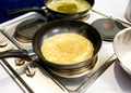 Freshly made crepe in frying pan, Crepe in the pan