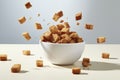 Freshly made crispy croutons fall in pile on gray background. Creative concept of floating healthy snacks.