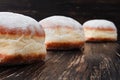 Freshly made doughnuts filled with jam and covered in powdered sugar Royalty Free Stock Photo