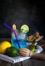 Freshly made drink gin and tonic with lime and cucumber slices