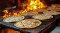 Freshly Made Flatbread Cooking Over an Open Fire Flame Royalty Free Stock Photo