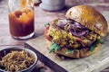 Freshly made insect burger with fried mealworms Royalty Free Stock Photo