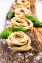 Freshly made italian pasta on wooden board Royalty Free Stock Photo