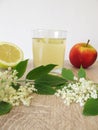 Lemonade with elder flowers, apple juice and lemon