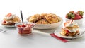 Freshly made mini strawberry shortcakes on a table against a sunny window. Royalty Free Stock Photo