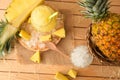 Freshly made pineapple slush on a wooden table in field Royalty Free Stock Photo