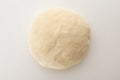 Freshly made wheat dough on white background