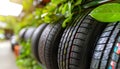 Freshly manufactured car tire displayed on a tire storage rack in a spacious warehouse facility.