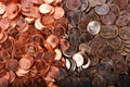 Numismatic background of uncirculated cents and nickels Royalty Free Stock Photo