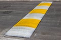 Freshly painted speed bump for slowing traffic near school Royalty Free Stock Photo