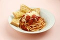 Freshly pasta with toasted garlic bread Royalty Free Stock Photo