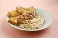 Freshly pasta with toasted garlic bread Royalty Free Stock Photo