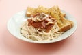 Freshly pasta with toasted garlic bread