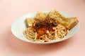 Freshly pasta with toasted garlic bread Royalty Free Stock Photo