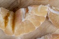 Freshly peeled pink pomelo on the table