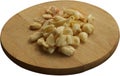 Freshly Peeled and Smashed Garlic on Wooden Cutting Board - Isolated Royalty Free Stock Photo