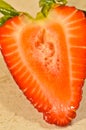 Freshly pick strawberry cut in half Royalty Free Stock Photo