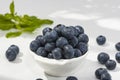 Freshly picked blueberries Blueberry closeup background on a white dish Royalty Free Stock Photo