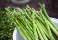 Freshly picked raw Asparagus and natural background